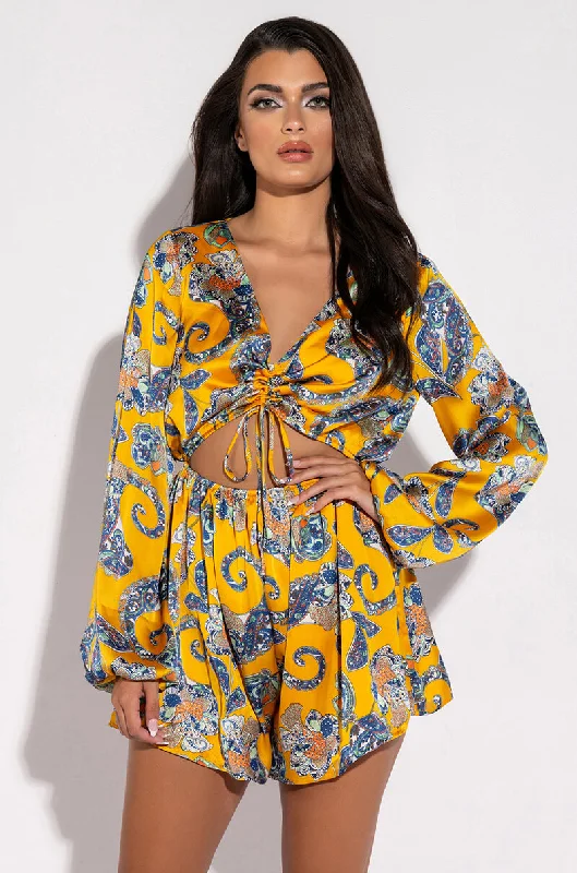 Chic Trend Collection ADMIT IT LONG SLEEVE PRINTED ROMPER WITH CUT OUT